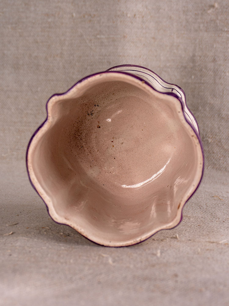 Antique French faience cache pot, 18th-century hand-painted Chinoiserie, scalloped edge, on textured beige fabric.