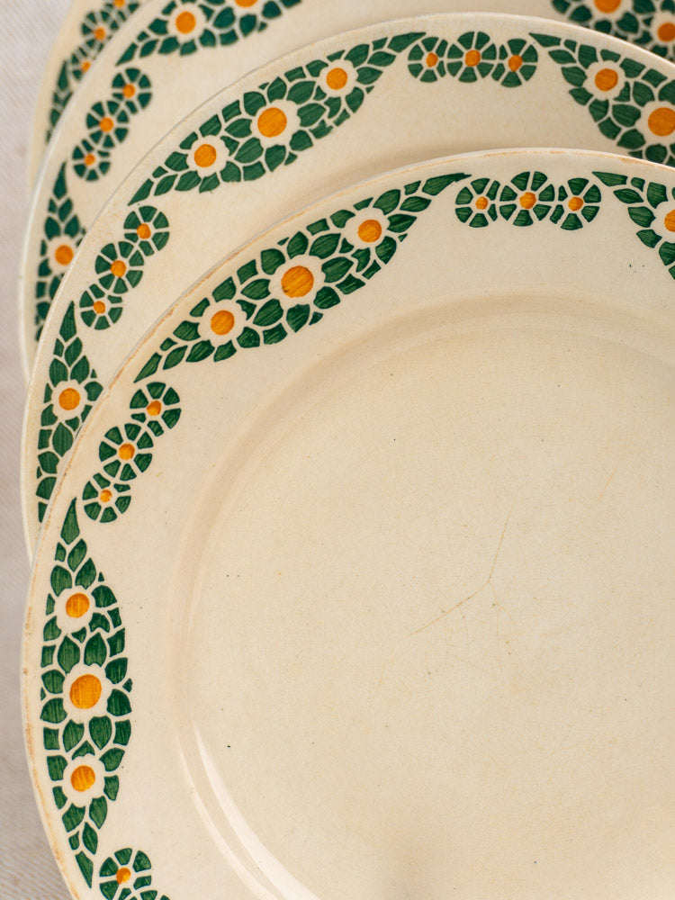 Antique French faience plate set by HBCM Creil Montereau, Trebeurden pattern, cream ceramic with green and yellow floral rims.