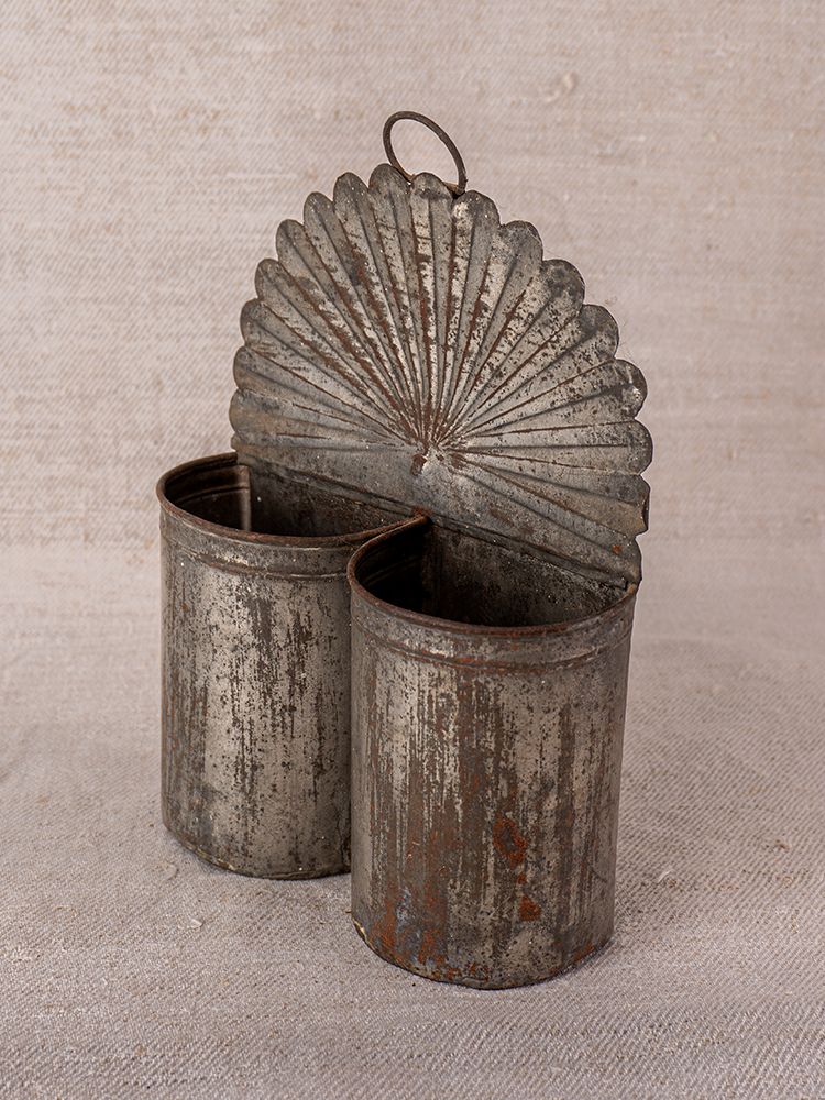 Provençal wall-mounted aged steel utensil holder with twin metal containers and fan-shaped decorative back.