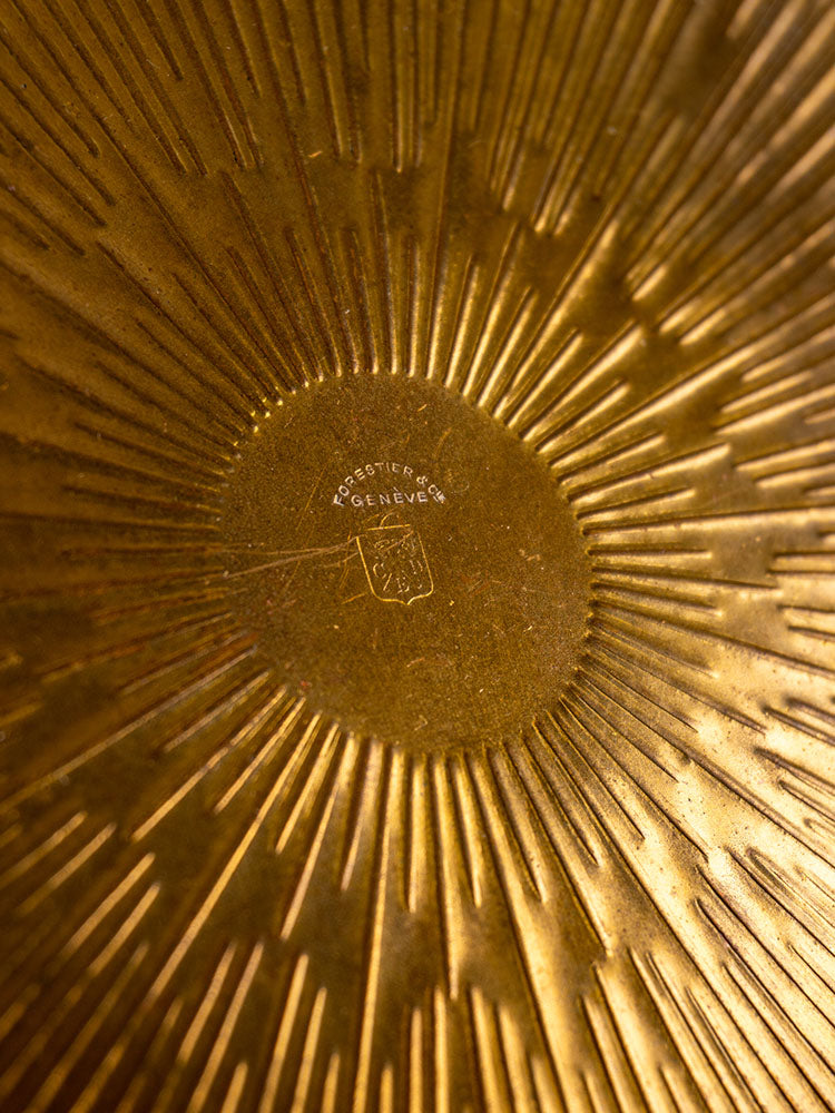 Vintage Swiss brass jardinière with golden radiating lines, embossed Forestier et Cie Genève mark, crest, and fruit motif.