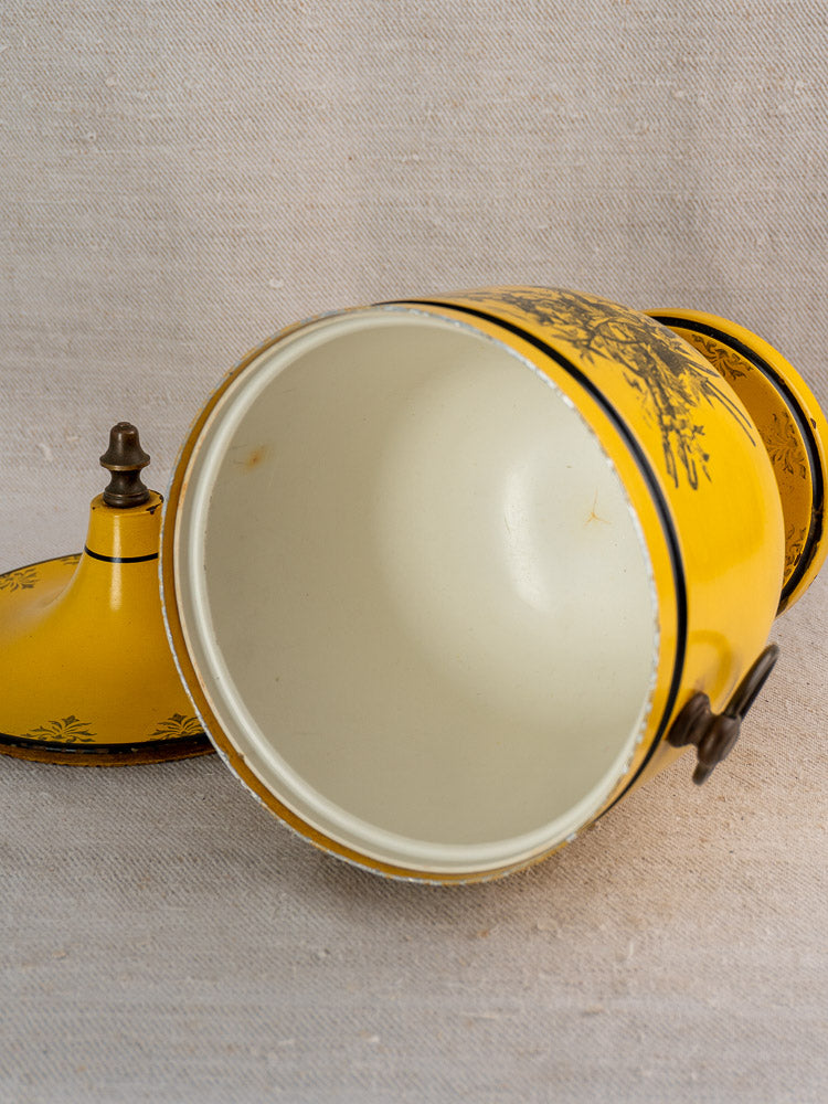 Vintage French yellow Tôle Peinte Directoire champagne cooler with lid, white interior, and black accents.