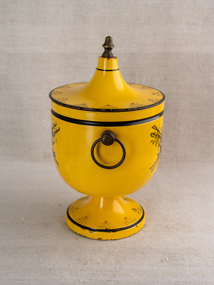 Vintage French Directoire-style yellow tôle peinte champagne cooler with lid, finial, floral motifs, and ring handle.