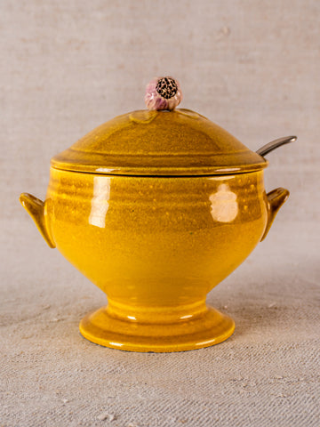 Signed Eyguières Provençal yellow ceramic tureen with pink floral lid knob and metal spoon.