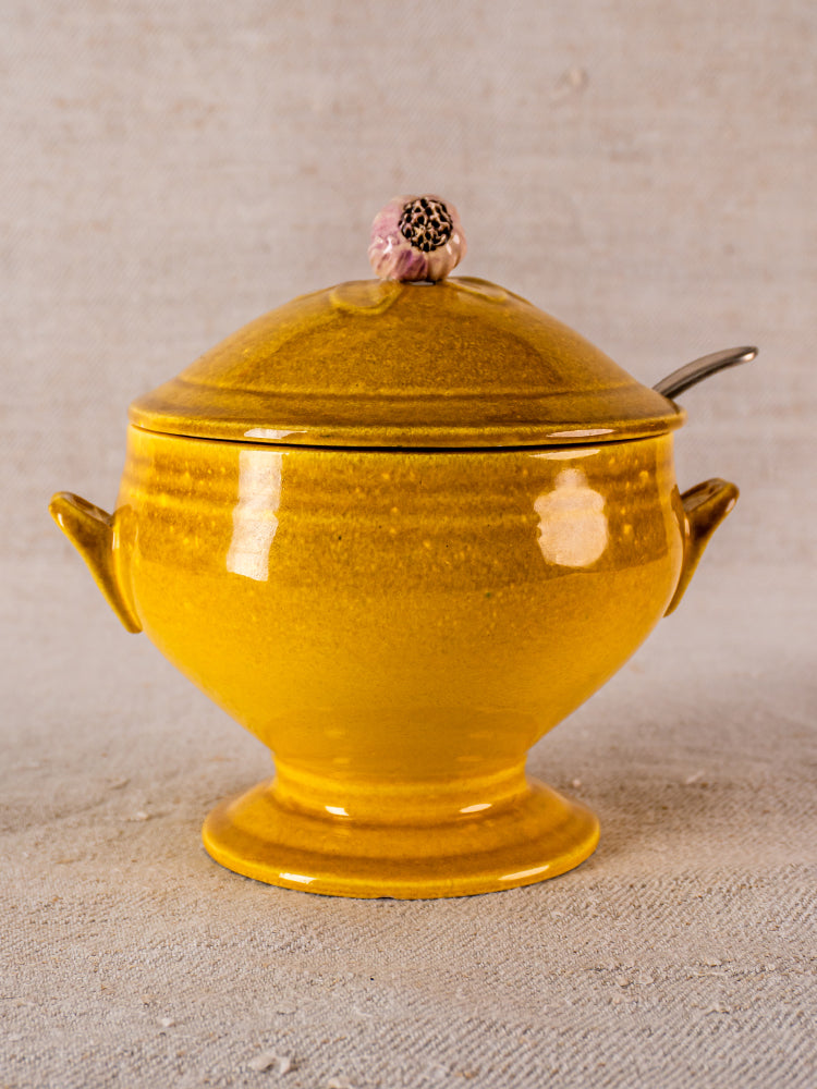 Signed Eyguières Provençal yellow ceramic tureen with pink floral lid knob and metal spoon.