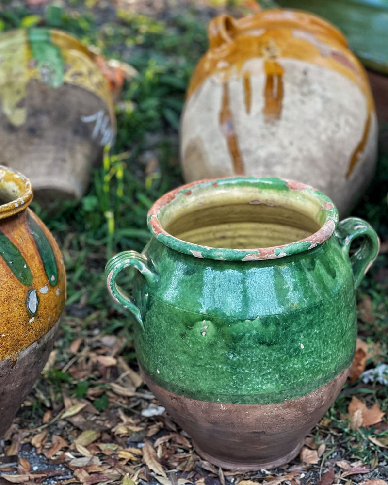 Terracotta confit pots at a village brocante