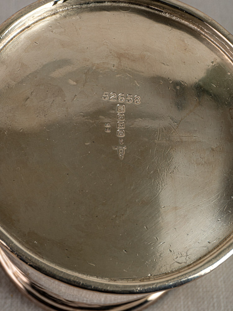 Antique English silver plate milk jug by Walker & Hall, Sheffield, circa 1900, with hallmarks and reflective, lightly scratched base.