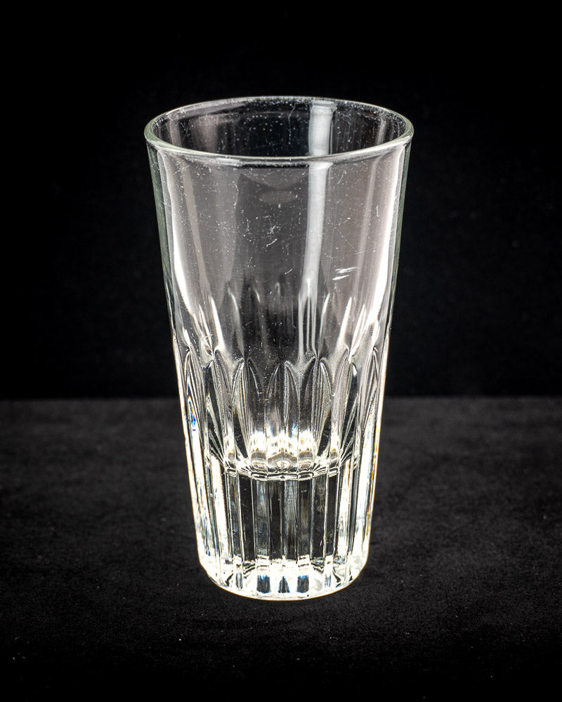 Set of six vintage French bistro fluted tumblers with vertical grooves in wrought iron and rattan caddy.