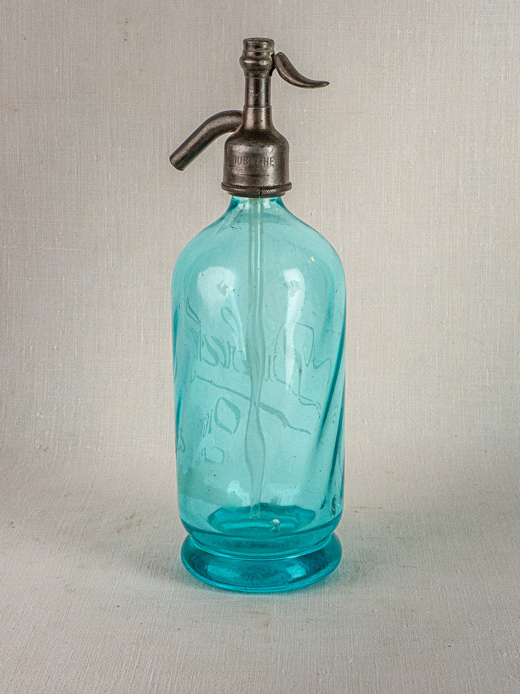 J. Dubuche antique French bistro seltzer bottle with vintage blue glass and metal siphon top.