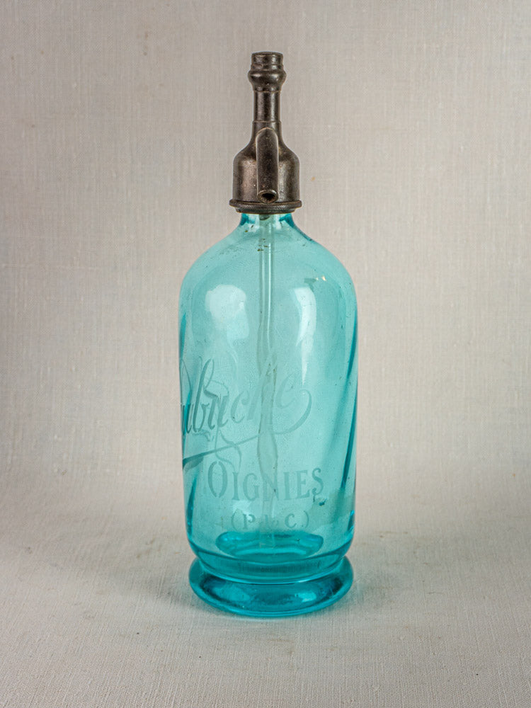 Antique French J. Dubuche aqua soda siphon with blue glass and metal top, embossed lettering.