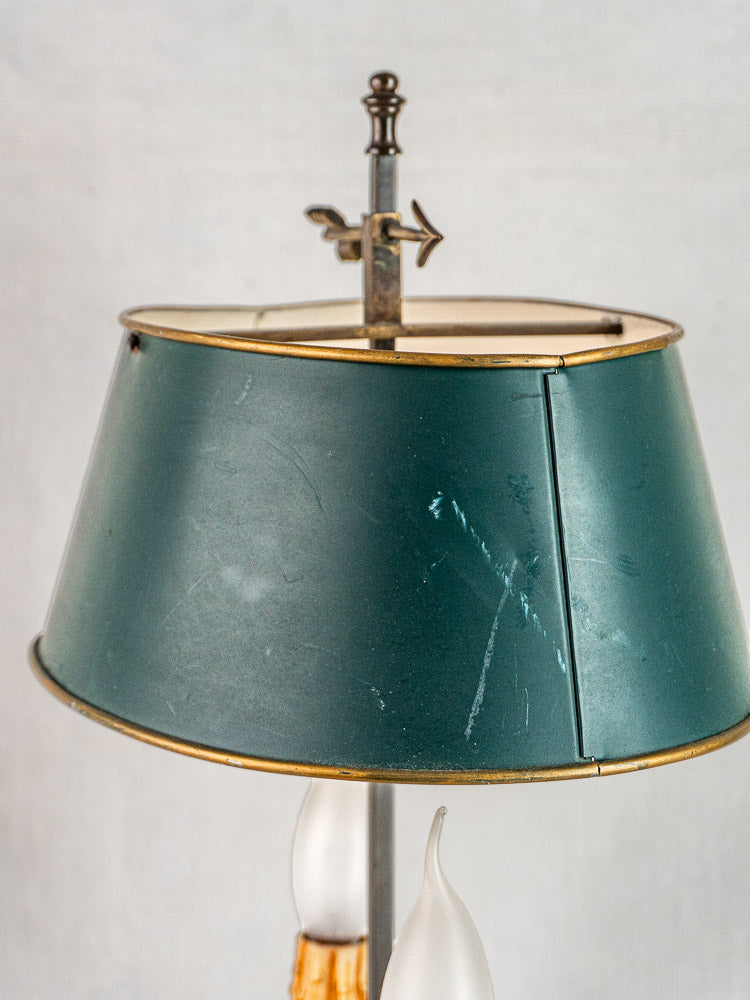 French Bouillotte lamp with vintage green tôle shade, Louis XVI style base, and frosted flame bulb covers.