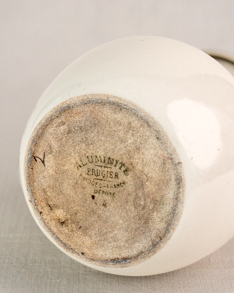 French Limoges Frugier aluminite porcelain coffee pot with stamped base and gently aged surface detailing.