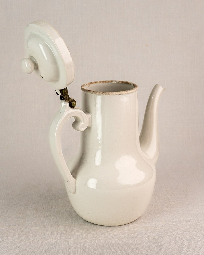 French Limoges aluminite porcelain coffee pot by Frugier with curved handle and open lid.