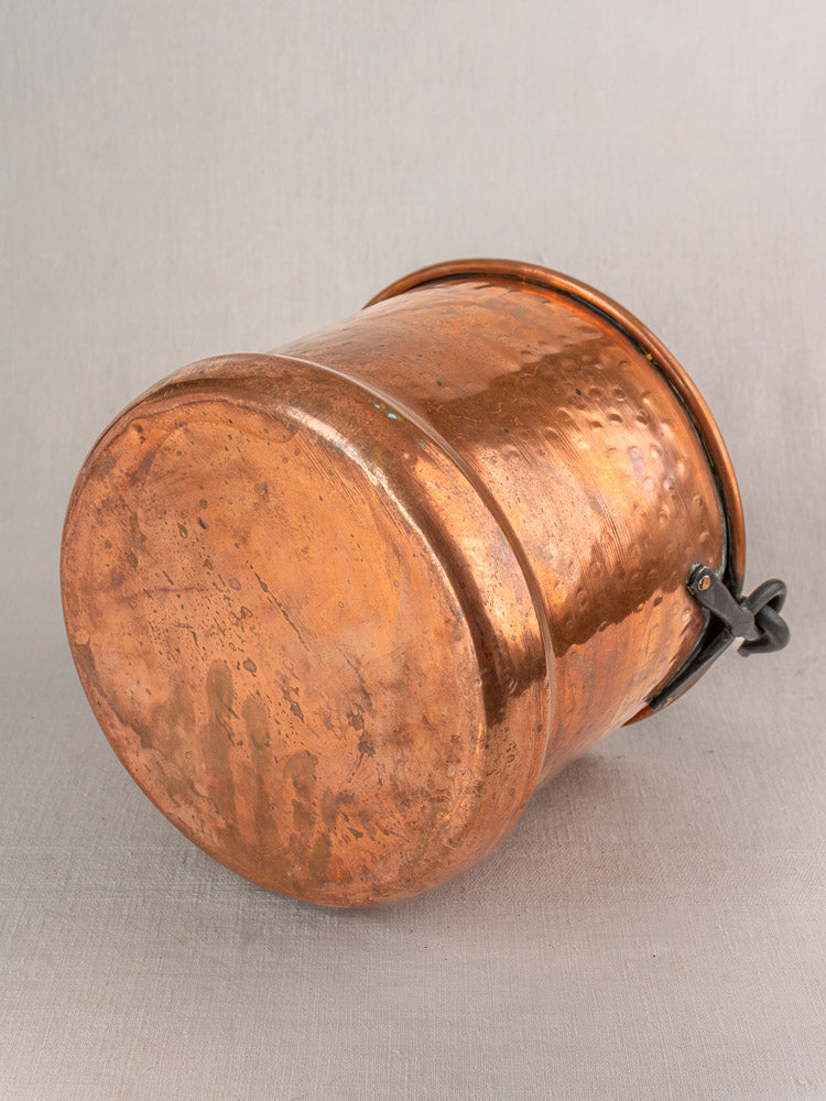 Pair of 19th-century French copper hanging buckets with flat bases and black handles on a neutral gray background.