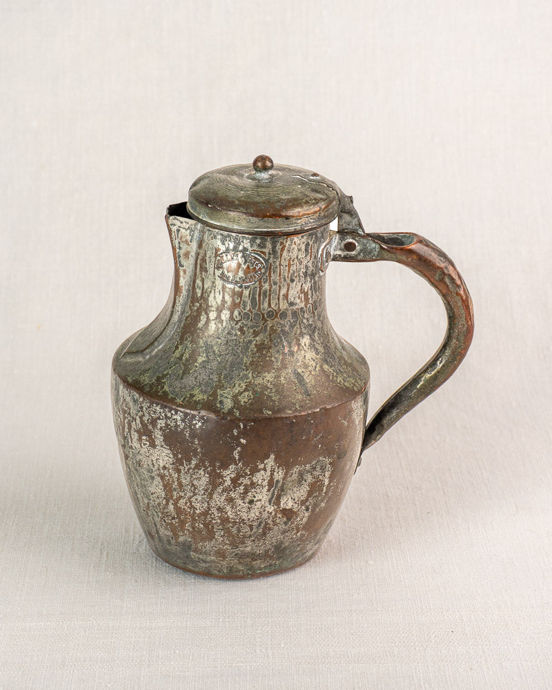 Antique French copper coquemar pitcher by Allez Frères Paris with textured surface and curved handle.