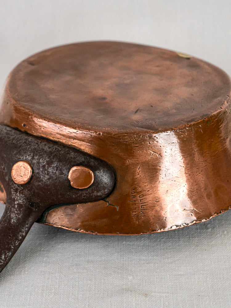 Antique 19th-century French copper sautoir with hand-hammered finish and dark aged handle.