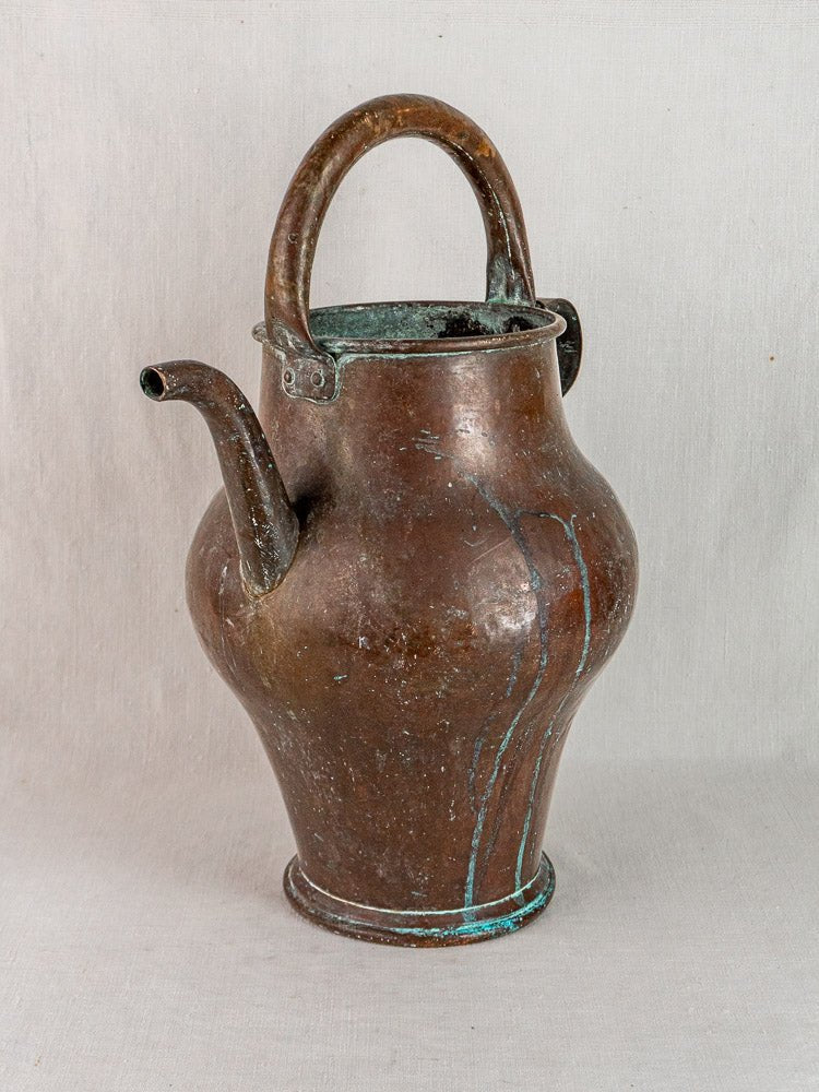 19th century French copper water jug with curved spout, large handle, and greenish-blue patina.
