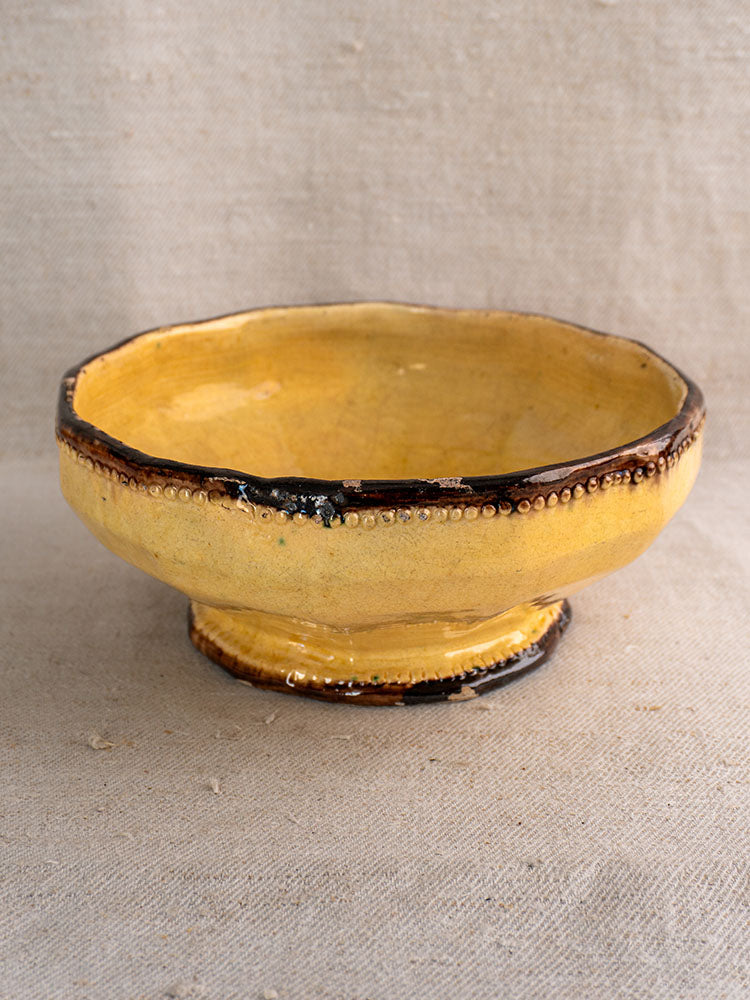 Vallauris Beretta et Cie mustard glazed French pottery set with ceramic bowl, uneven rim, and glossy finish.
