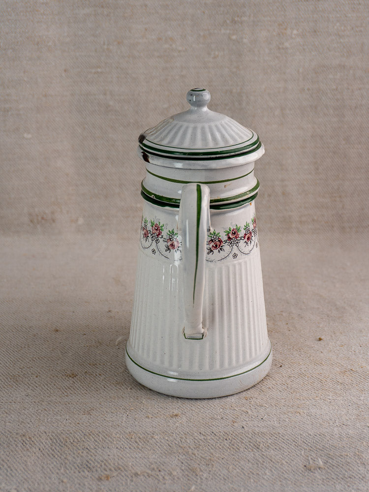 Antique French enamel coffee pot by B.B. Frères with white finish, green trim, floral band, and vertical ridges.