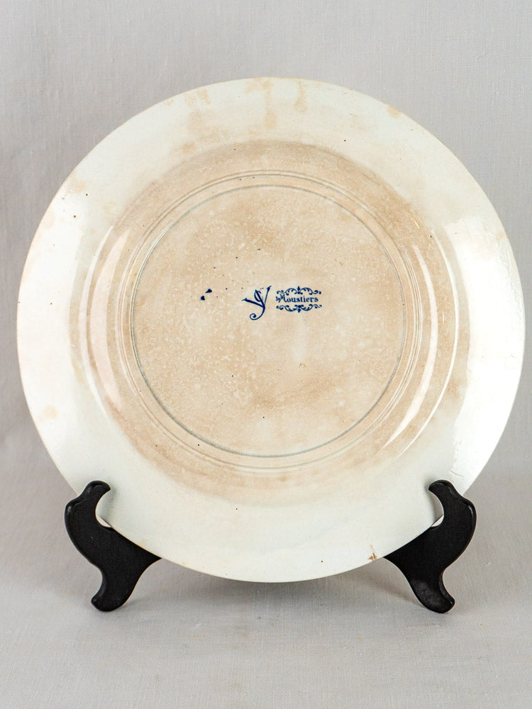 Antique Jules Vieillard Bordeaux ceramic plate with blue faience mark, visible stains, on black stand.