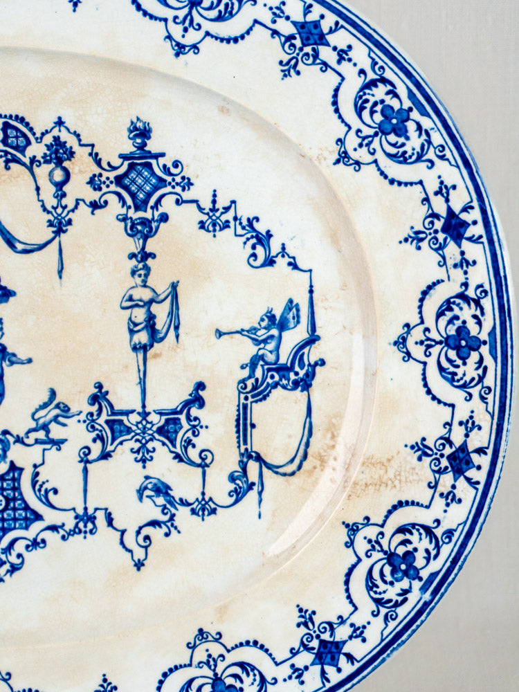 Antique French Jules Vieillard Bordeaux Moustiers blue faience plate with intricate patterns and vintage patina.