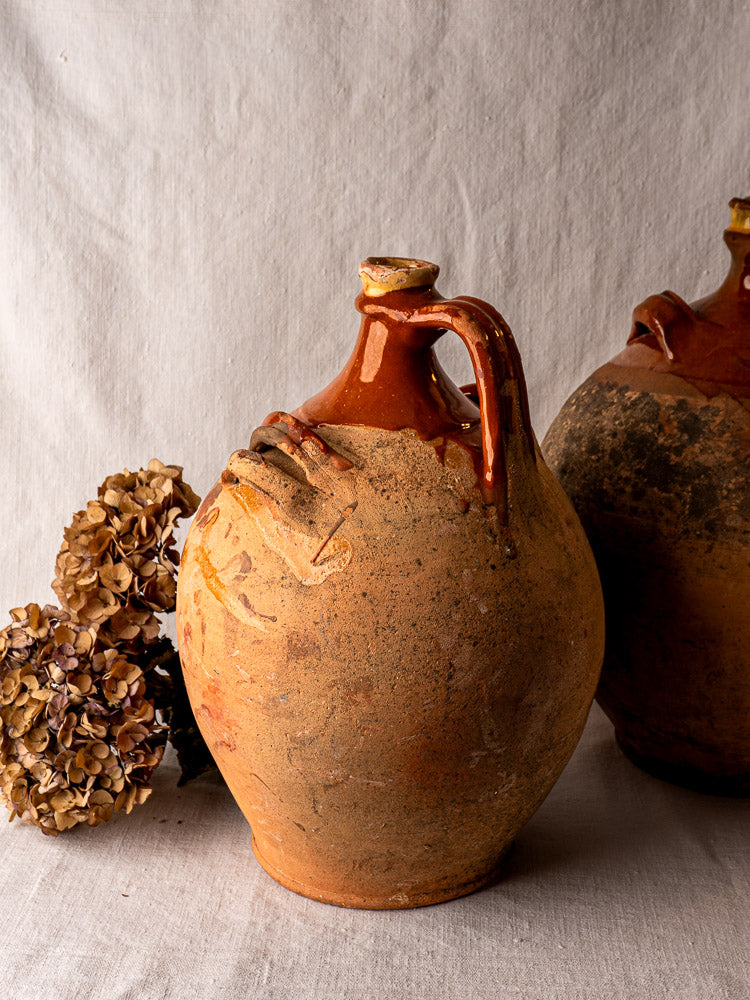 19th-century French gargoulette water jug with brown-glazed terracotta and dripped glaze detail.