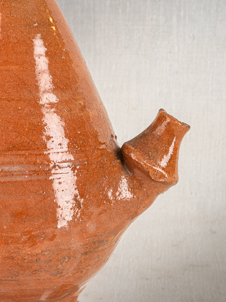 Antique French mammiforme jug spout in glossy reddish-brown glazed terracotta, Provence pottery style.