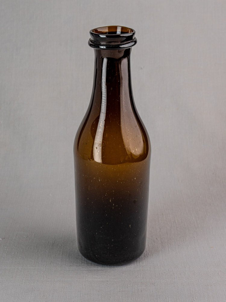 Antique 19th-century French hand-blown glass truffle jar in rich brown verre soufflé, uncapped.