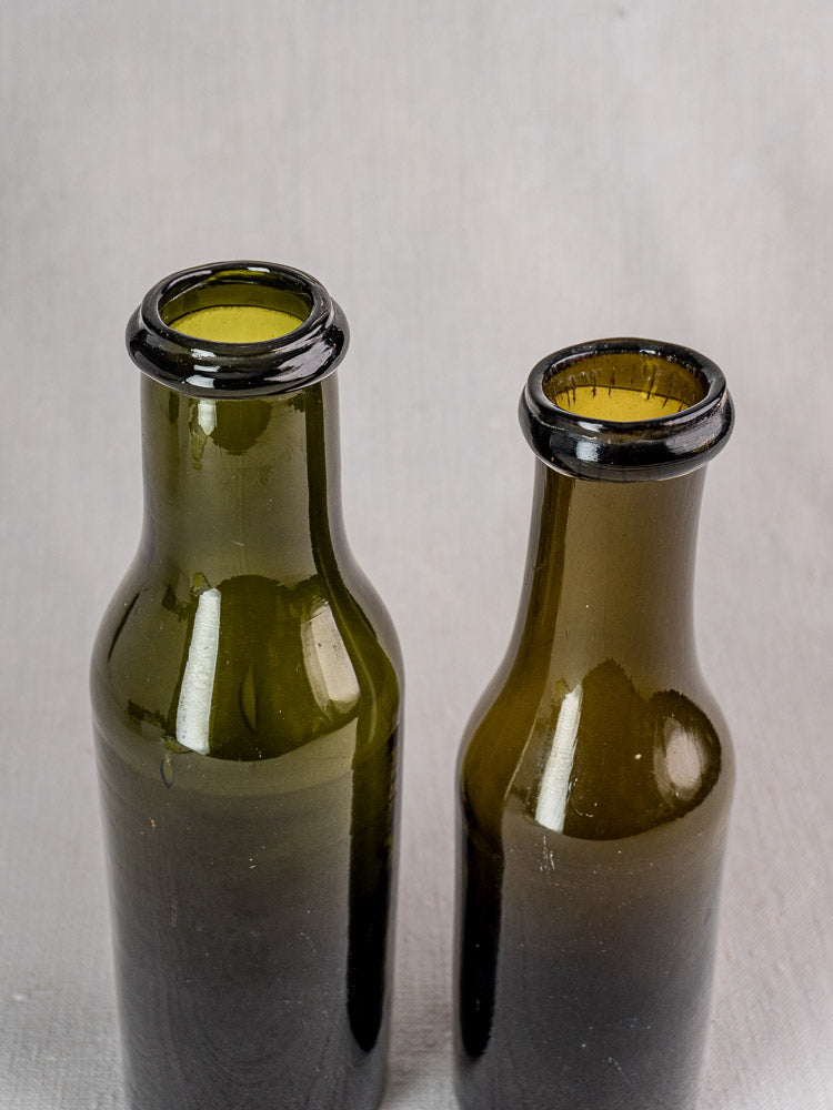 Pair of antique French truffle jars in olive green hand-blown glass with wide necks.