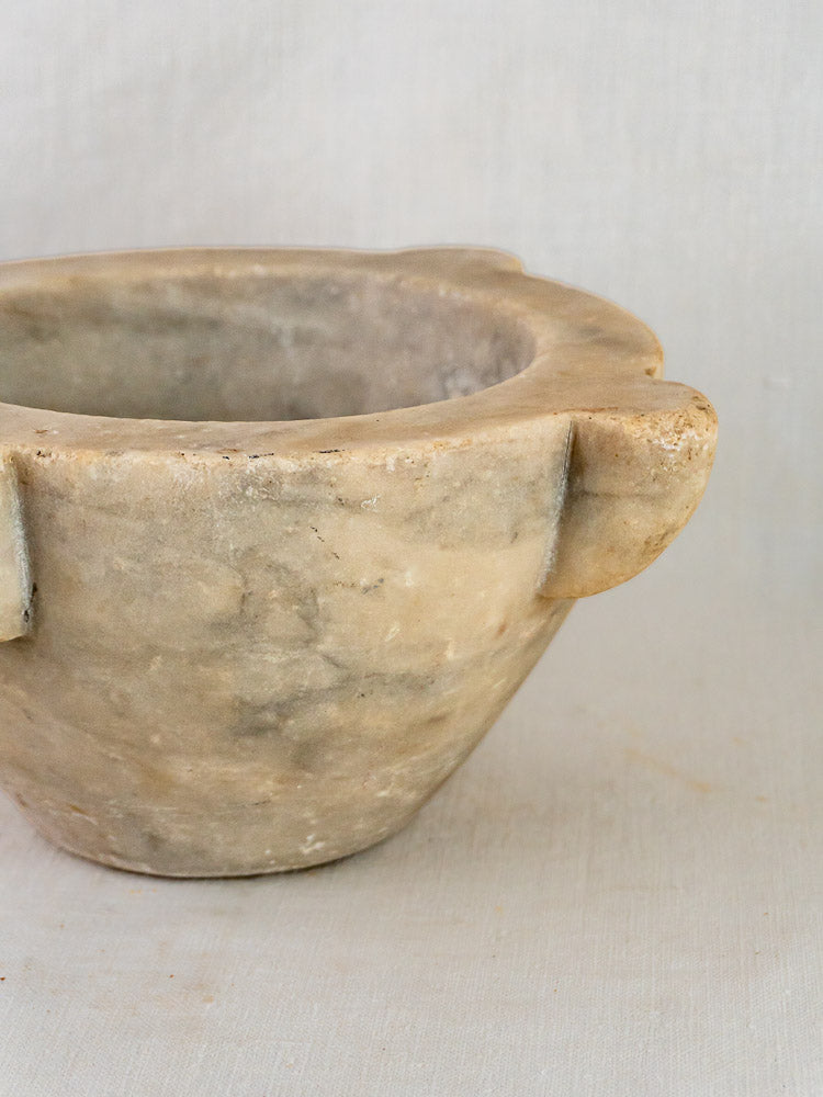 Antique French marble mortar and pestle, hand-carved with thick rim and three small handles.