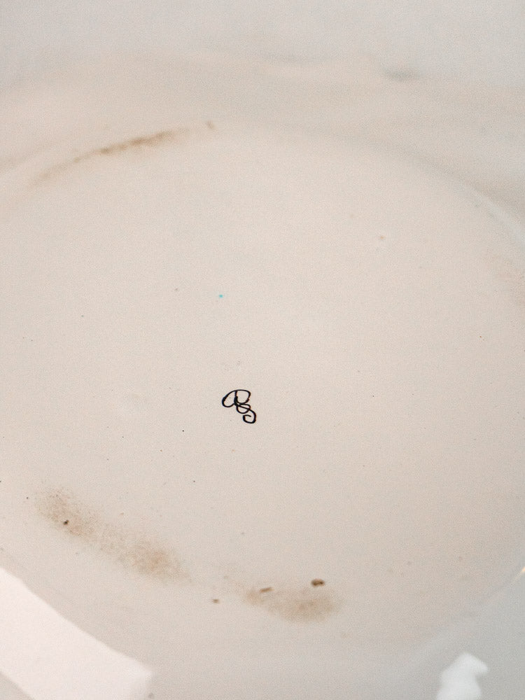 Antique French faience platter with Moustiers blue and white decoration, minor central stain.