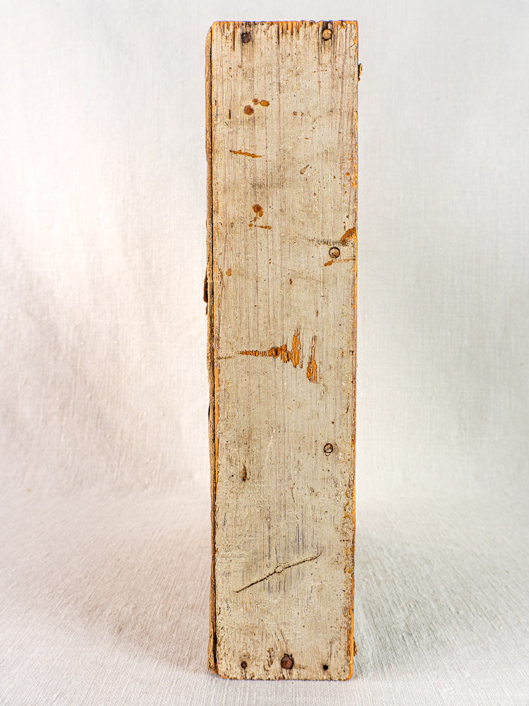 Antique French painted pine casier with 9 compartments and weathered, pale finish; visible wood grain.
