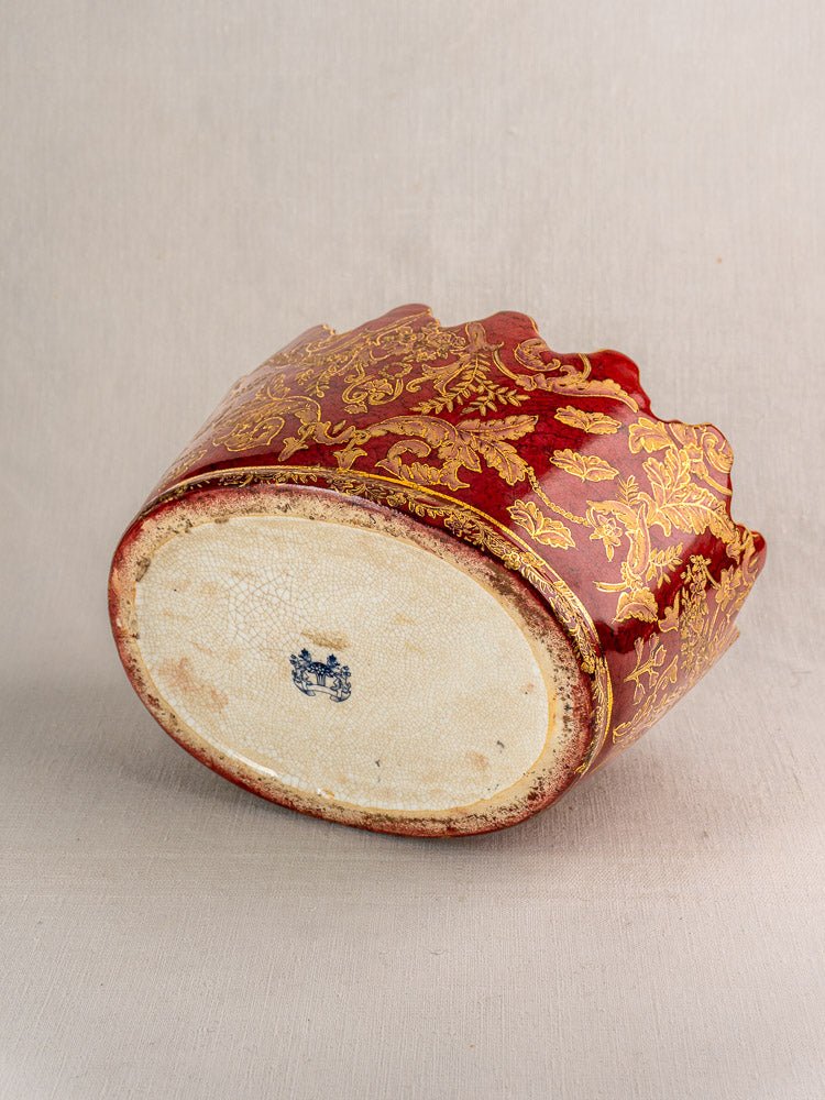 Late 19th-century French Terre de Fer wine cooler with ornate red and gold ceramic design, blue maker’s mark.