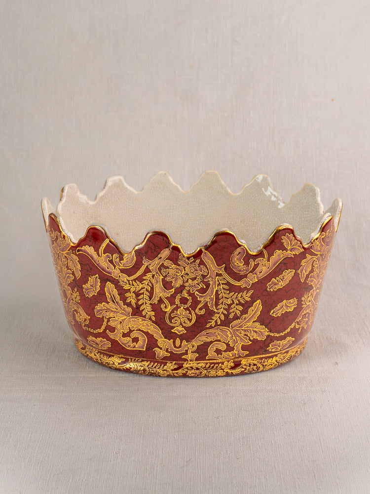 Antique French Terre de Fer ironstone wine cooler with scalloped rim, red and gold floral motifs.