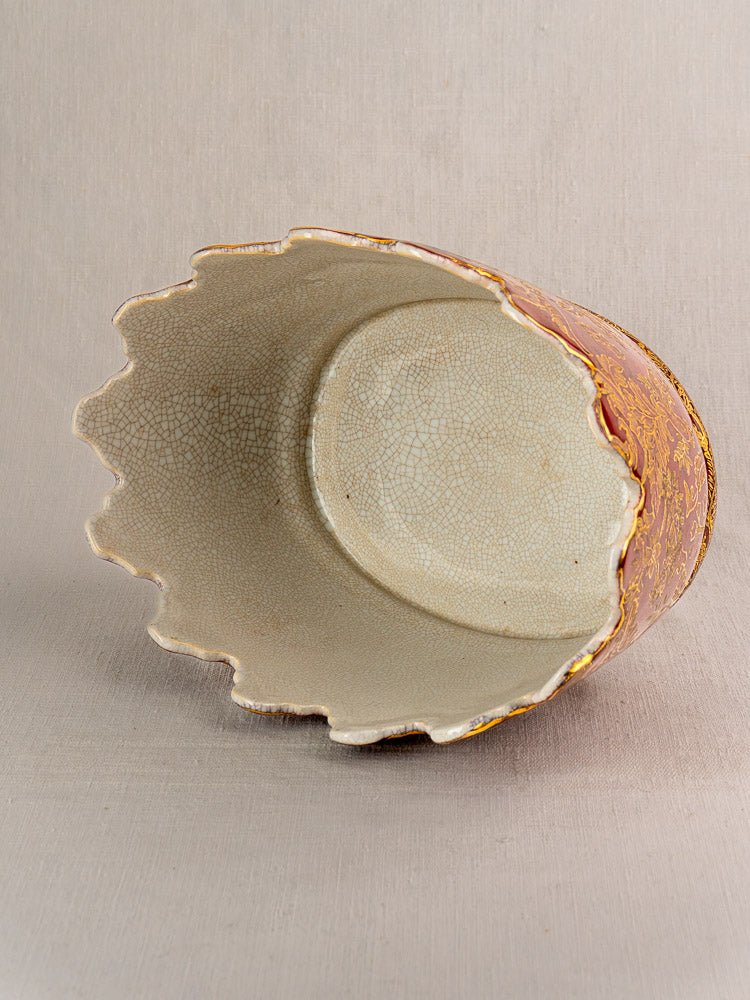 Antique French Terre de Fer wine cooler with scalloped rim, crackled cream interior, red and gold exterior.