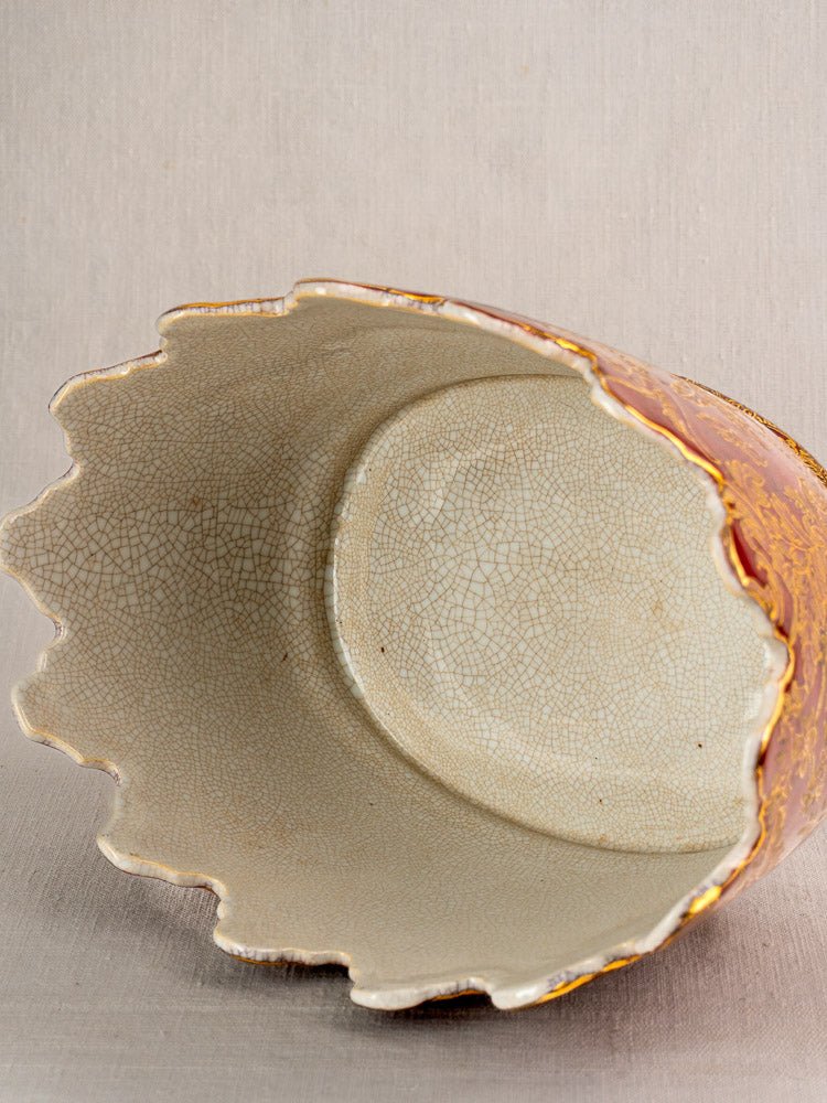 Antique French ceramic Rafraîchissoir with jagged rim, crackle glaze interior, and textured reddish-brown exterior.