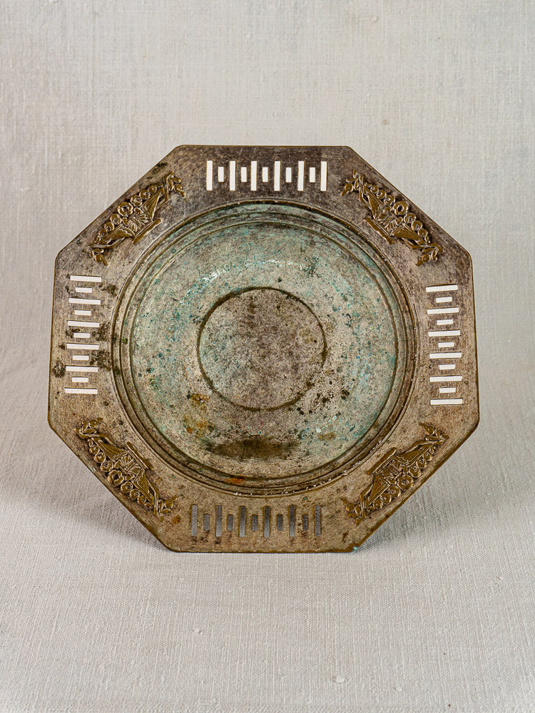 Art Deco French silver plate tazza, octagonal coupe with cutouts and ornate edge, tarnished finish.