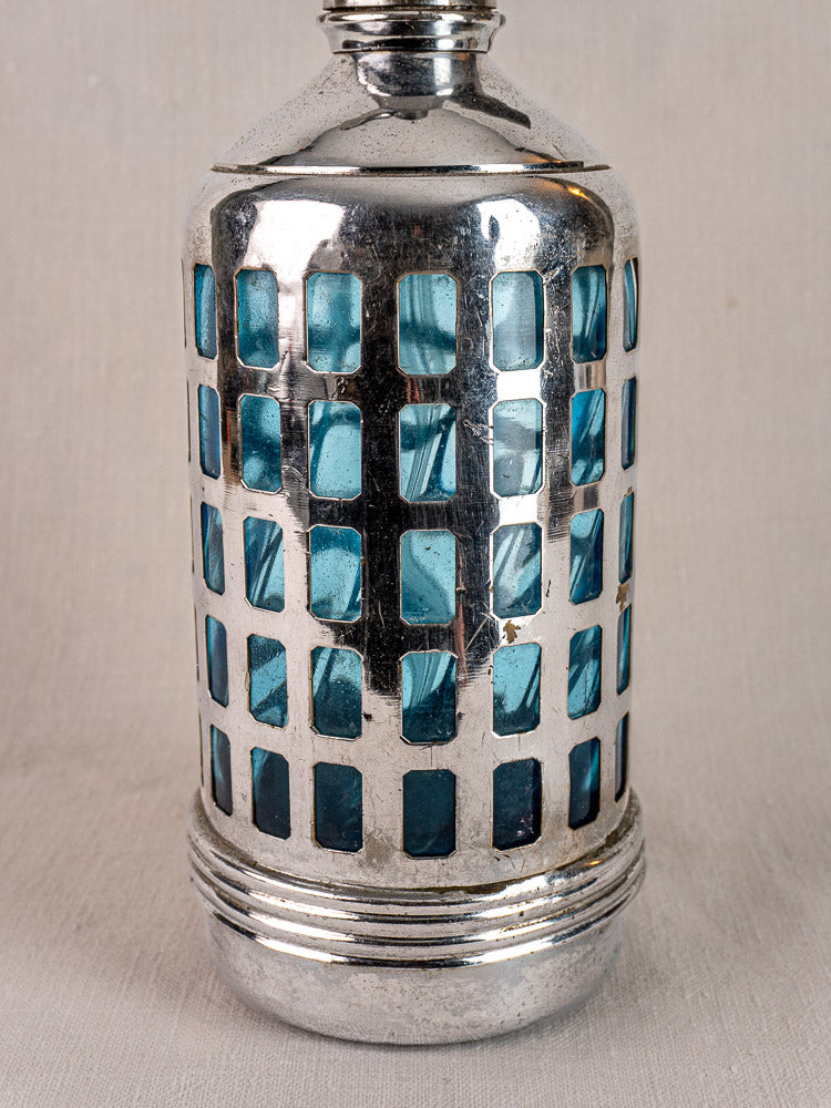 Antique French soda siphon with blue glass bottle in silver metal holder, Paris bistro style, 1920–1940.