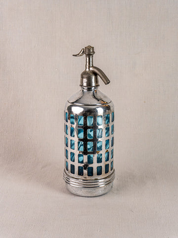 Antique French Gazo-Siphon with silver top and blue glass in lattice, Paris Bistro 1920–1940, on neutral surface.