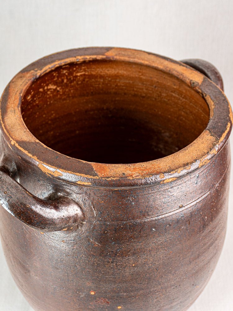 Antique French Pot à Graisse storage jar in salt glazed stoneware with handles and textured surface.