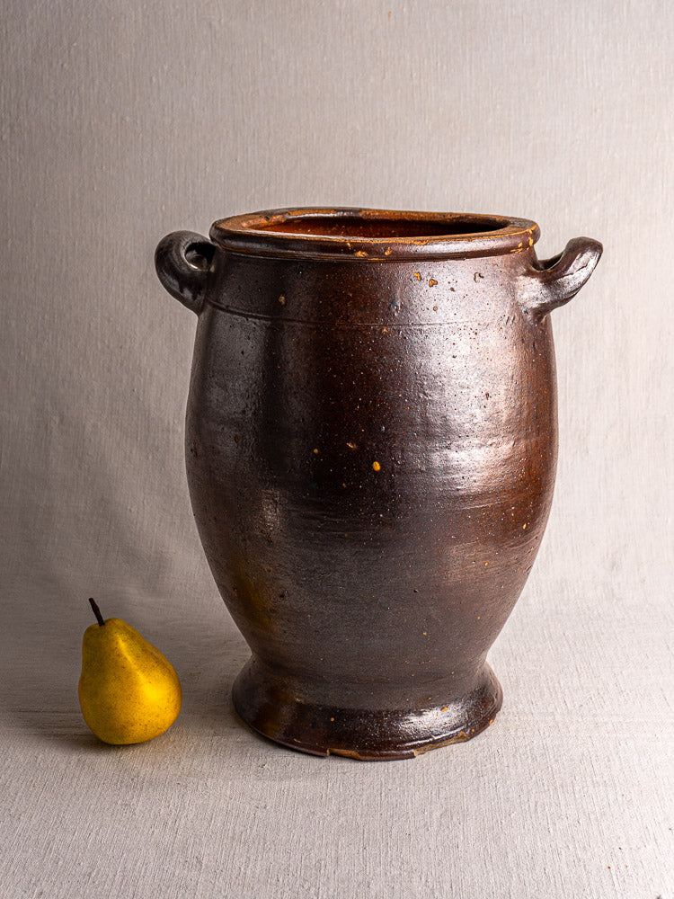 Large antique French salt-glazed stoneware Pot à Graisse with dark brown glossy finish, wide mouth, and two side handles.