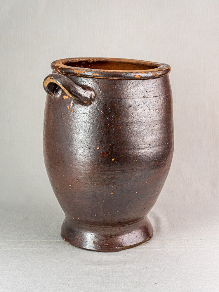 Large antique French Pot à Graisse in salt-glazed stoneware with dark brown finish and single handle.