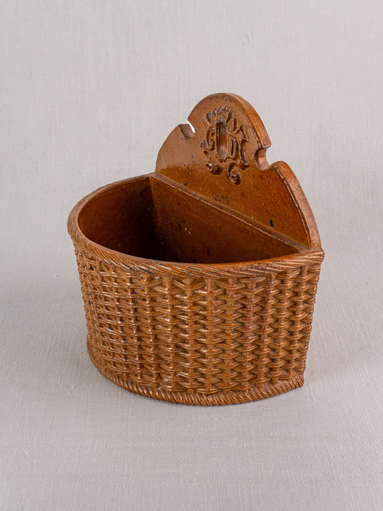 Antique French salt-glazed stoneware salt box with woven basket motif and ornate raised design, late 19th–early 20th century.