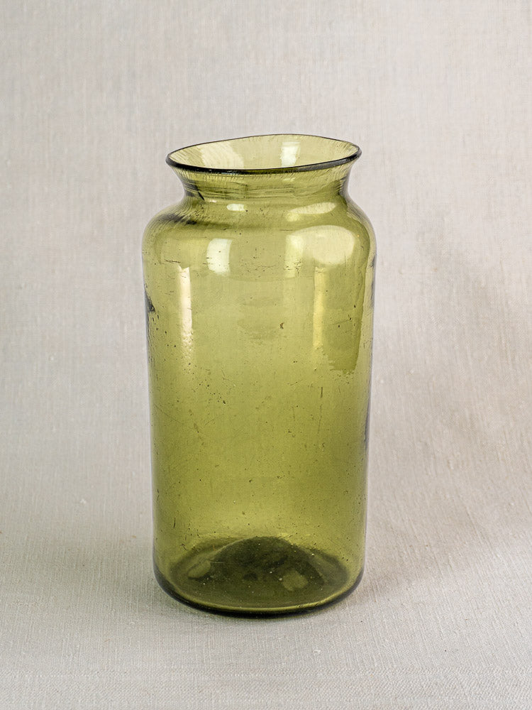 Antique French olive green glass preserve jar, hand-blown with wide mouth and flared rim, late 18th century.