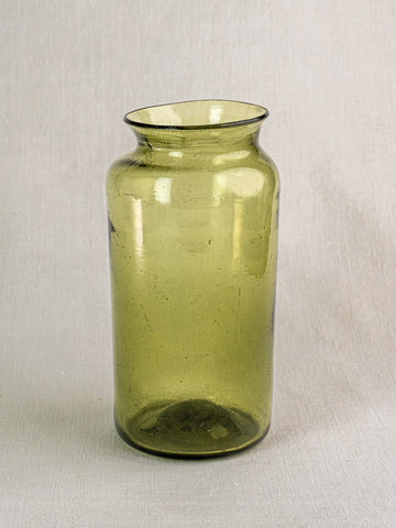 Antique French olive green glass preserve jar, hand-blown with wide mouth and flared rim, late 18th century.