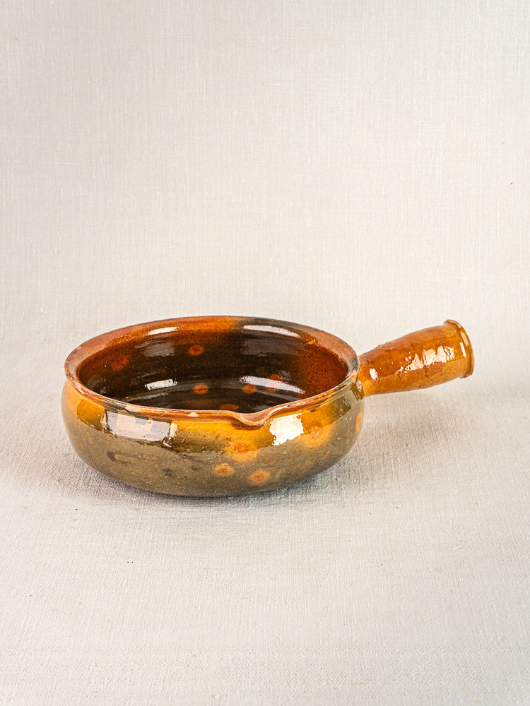 Pair of antique French terracotta poêlons with glossy brown glaze and short handles.