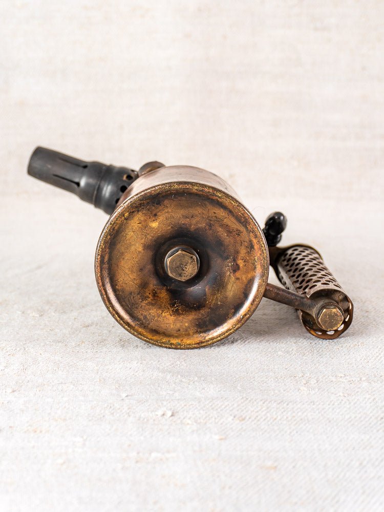 Vintage French blowtorch by Vesta F.J. Paris, circa 1920, with round base and perforated handle.