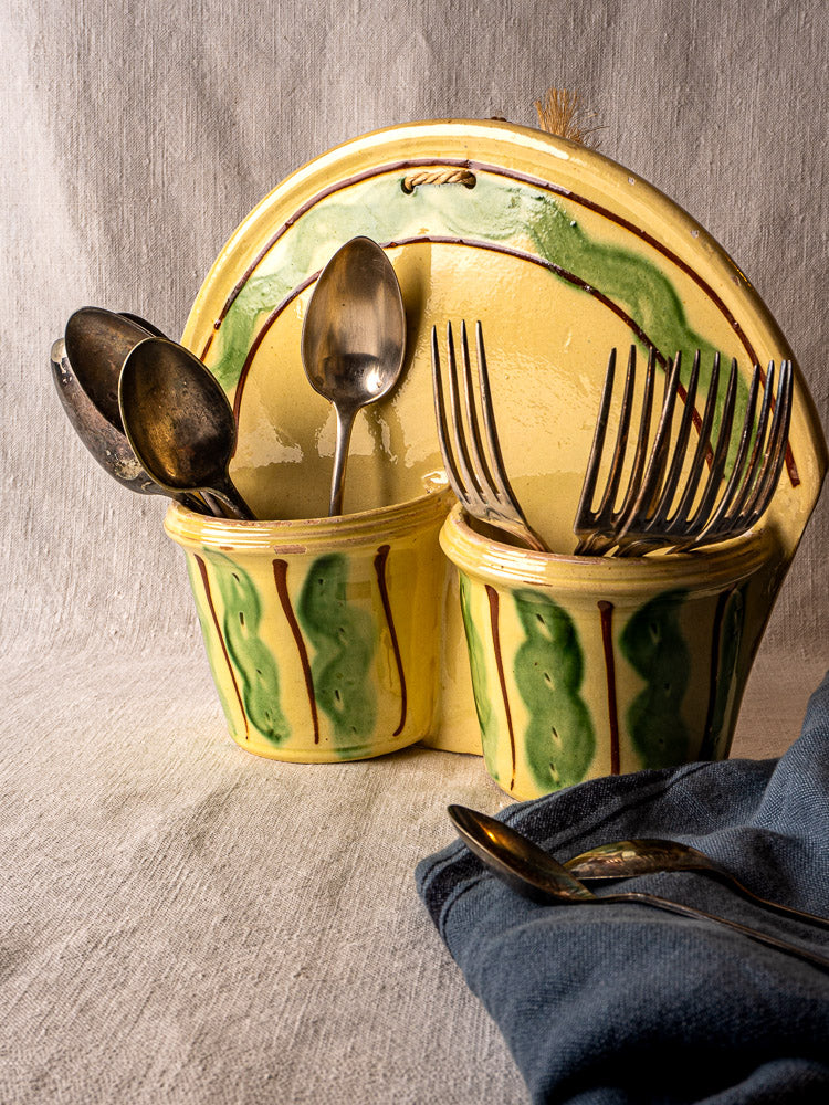 Vintage French Cliousclat yellow and green glazed earthenware cutlery holder with matching cups and coordinated plates.