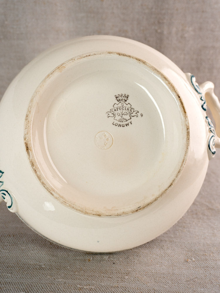 Antique French Longwy ironstone tureen with blue transferware, Capucine accents, and black maker’s mark.
