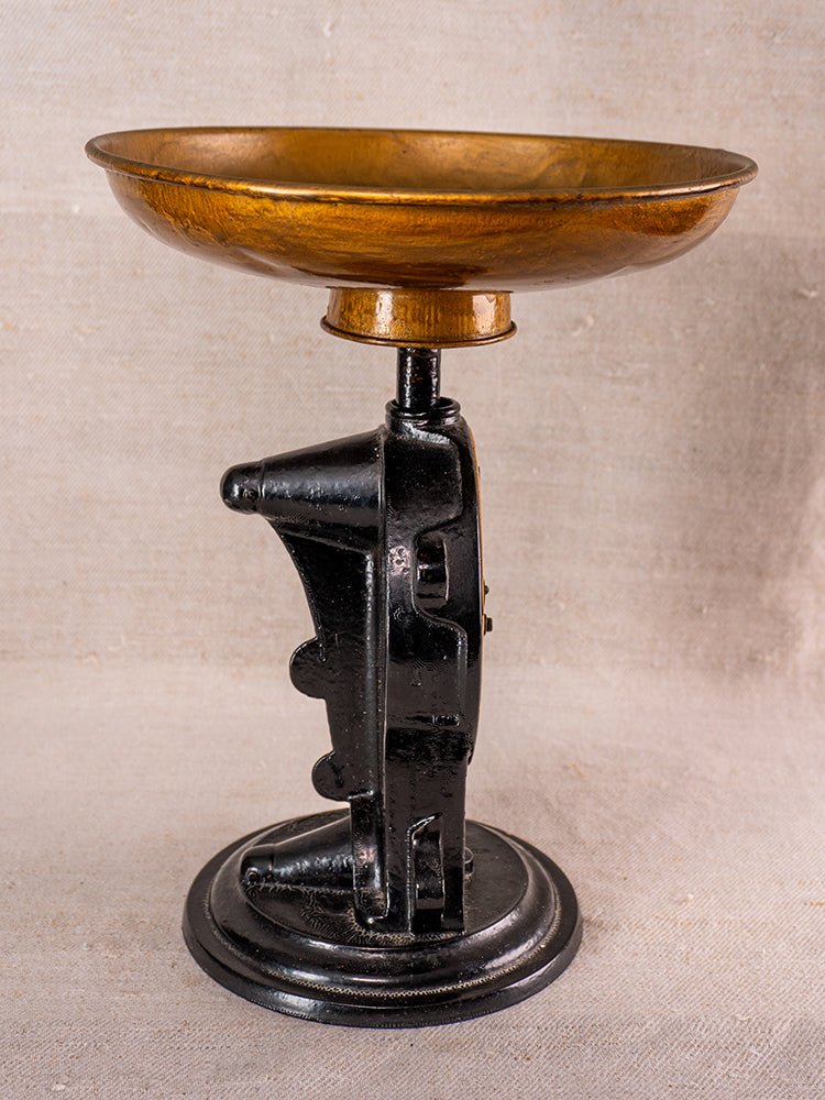 Antique Salter Wirthschafts Waage No. 50 cast iron scale with brass pan, on neutral fabric.
