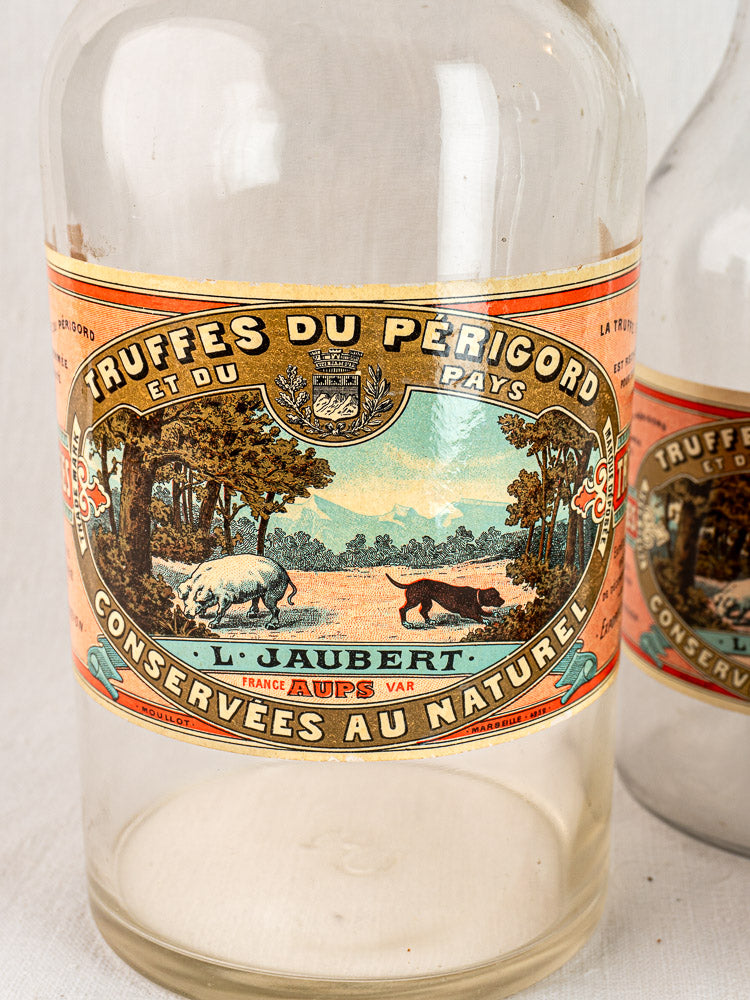 Set of three antique French L. Jaubert truffle jars with vintage Truffes du Perigord labels.